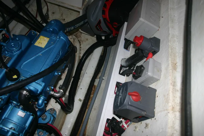 Que Sera Yacht Photos Pics Engine compartment of 2009 Prout 45S with electrical components and wiring.
