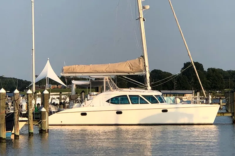 Que Sera Yacht Photos Pics Sailing catamaran Prout 45S, 2009 model, docked at a marina.