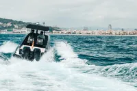 Speedboat Fabio Buzzi FB 38/19 S cruising on ocean near city skyline, 2008 model.