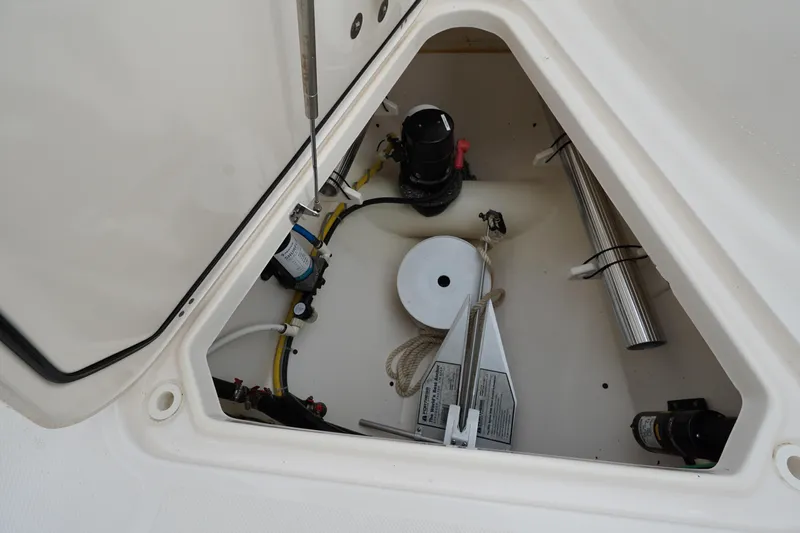  Yacht Photos Pics Storage compartment of 2016 Pursuit ST 310 Sport boat with equipment and accessories.