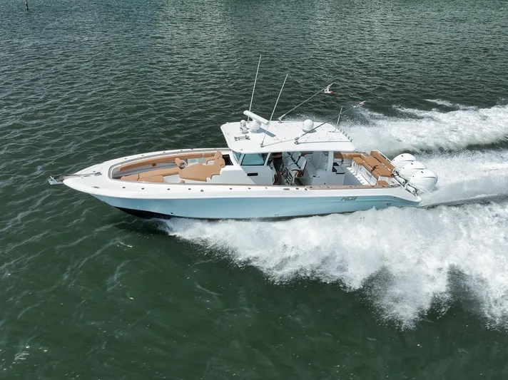 Mo Jack Yacht Photos Pics 2022 HCB Lujo boat cruising on open water, showcasing sleek design and powerful performance.