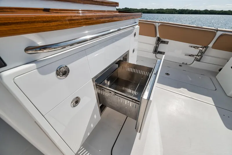 Mo Jack Yacht Photos Pics Luxury HCB Lujo 2022 boat with open stainless steel drawer on deck.