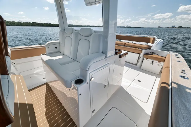Mo Jack Yacht Photos Pics 2022 HCB Lujo boat interior with luxurious seating and sleek design on open water.