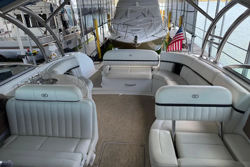  Yacht Photos Pics Luxurious 2018 Cobalt R35 boat interior with plush seating and American flag.