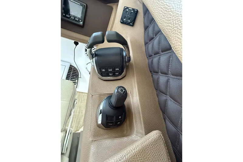  Yacht Photos Pics Control panel of 2018 Cobalt R35 boat with joystick and throttle levers.