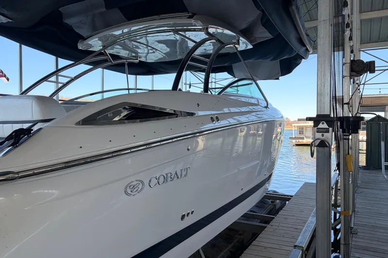  Yacht Photos Pics 2018 Cobalt R35 boat docked, showcasing sleek design and modern features.