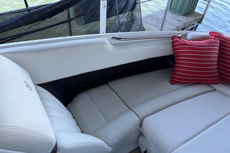  Yacht Photos Pics Luxurious seating on 2018 Cobalt R35 boat with red striped cushion.