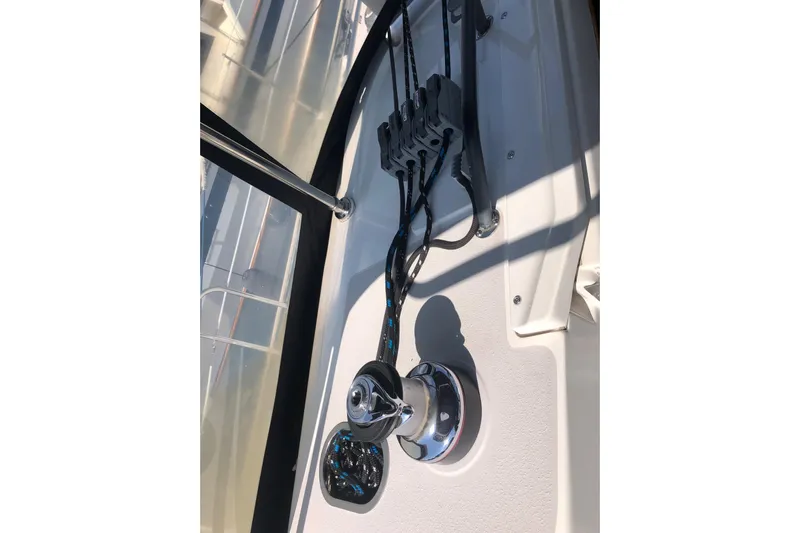 Charmed Life Yacht Photos Pics Sailing rigging on a 2000 Catalina 470 yacht deck, featuring winch and cleats.