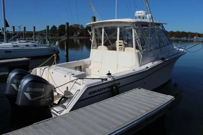 Tide Traveler Yacht Photos Pics 2008 Grady-White Express 330 boat docked with twin Yamaha engines.