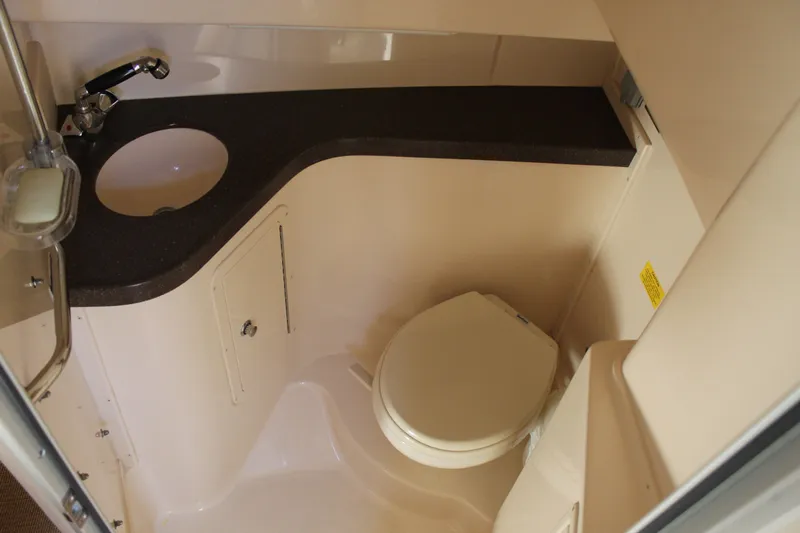 Tide Traveler Yacht Photos Pics 2008 Grady-White Express 330 boat bathroom with sink and toilet.