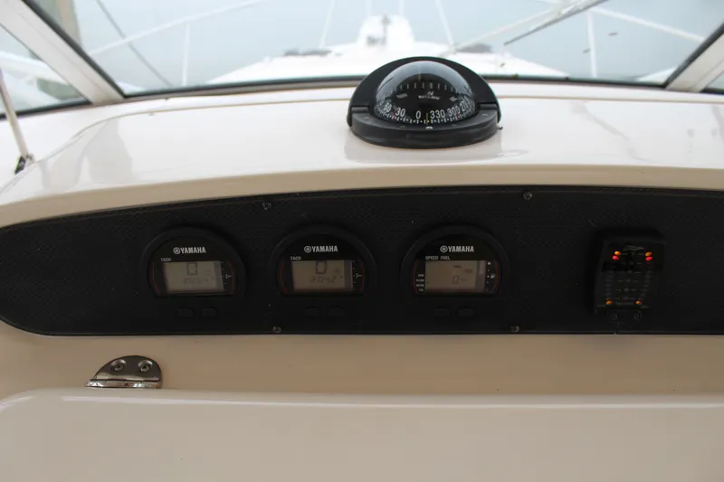 Tide Traveler Yacht Photos Pics Dashboard of 2008 Grady-White Express 330 with Yamaha gauges and compass.