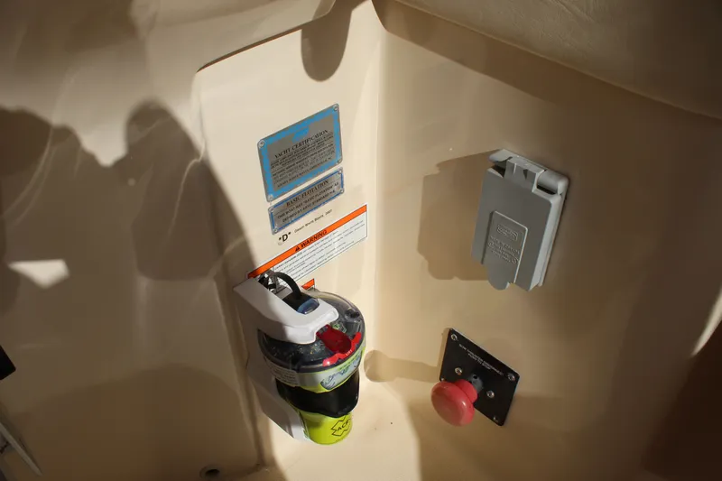 Tide Traveler Yacht Photos Pics 2008 Grady-White Express 330 interior with safety equipment and certification labels.