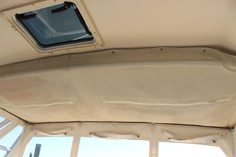 Tide Traveler Yacht Photos Pics 2008 Grady-White Express 330 boat interior ceiling with hatch window.