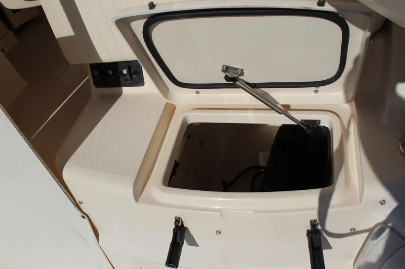Tide Traveler Yacht Photos Pics Open storage compartment on 2008 Grady-White Express 330 boat.