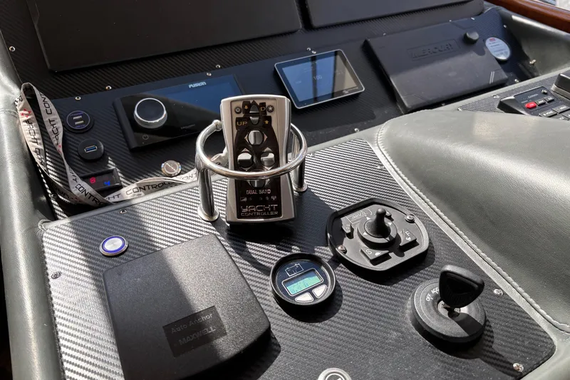 Dolce Far Niente Yacht Photos Pics Control panel of a 2012 Maritimo C53 Sports Cabriolet yacht with various instruments.