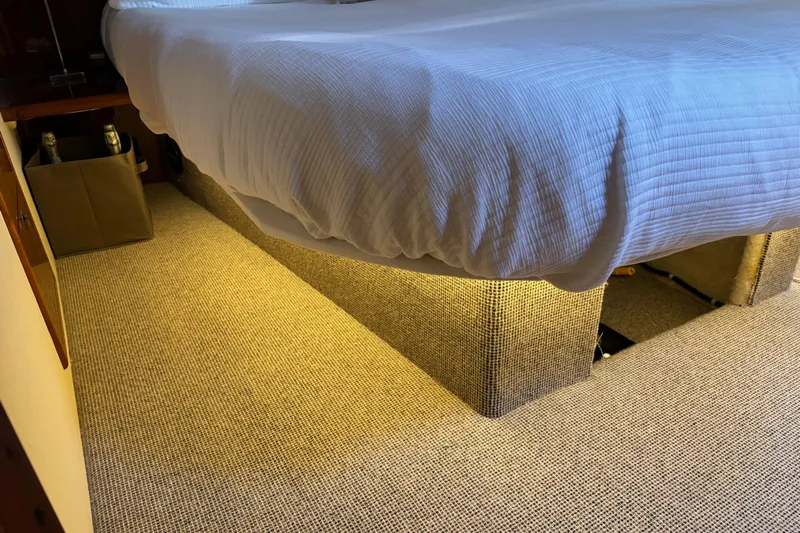 Dolce Far Niente Yacht Photos Pics Luxurious cabin interior of 2012 Maritimo C53 Sports Cabriolet with illuminated bed base.