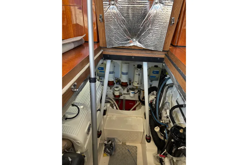 Dolce Far Niente Yacht Photos Pics Engine room of 2012 Maritimo C53 Sports Cabriolet, showcasing mechanical components and insulation.