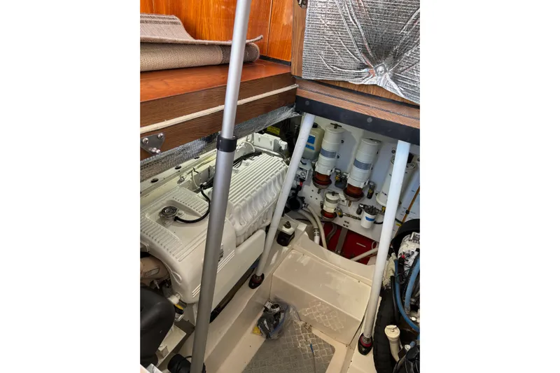 Dolce Far Niente Yacht Photos Pics Engine room of 2012 Maritimo C53 Sports Cabriolet with visible components and equipment.