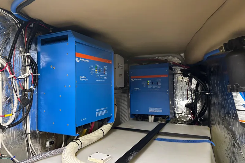 Dolce Far Niente Yacht Photos Pics Electrical system inside 2012 Maritimo C53 Sports Cabriolet yacht, featuring Victron Energy equipment.