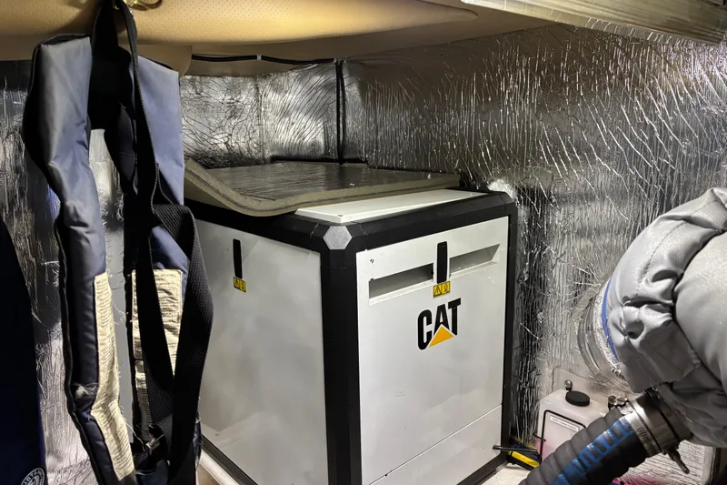 Dolce Far Niente Yacht Photos Pics Engine room of 2012 Maritimo C53 Sports Cabriolet with CAT machinery and insulation.