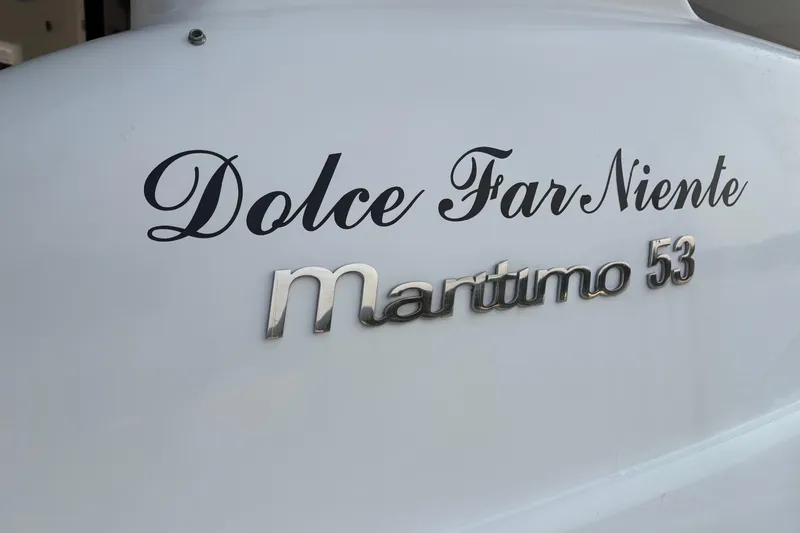 Dolce Far Niente Yacht Photos Pics Maritimo C53 Sports Cabriolet 2012 with 'Dolce Far Niente' inscription on hull.