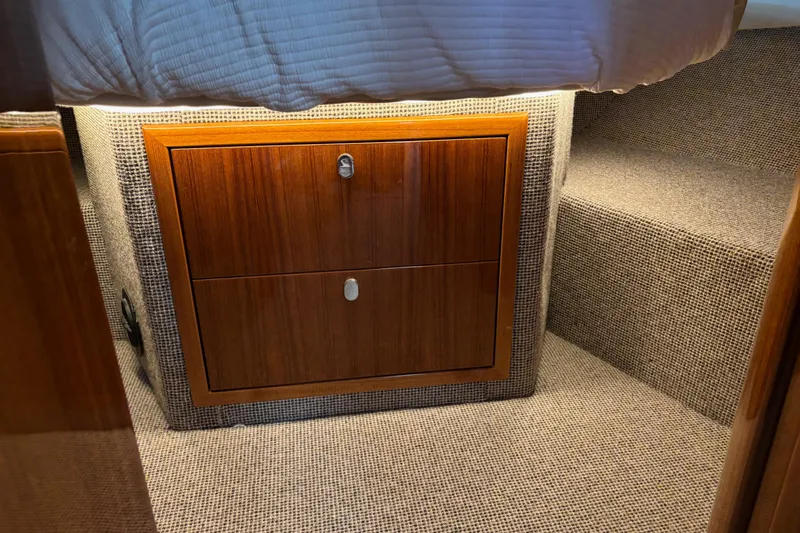 Dolce Far Niente Yacht Photos Pics Interior of 2012 Maritimo C53 Sports Cabriolet with wooden cabinet and carpeted stairs.