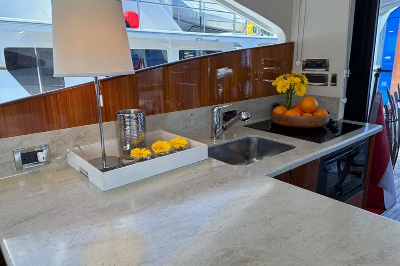 Dolce Far Niente Yacht Photos Pics Interior of 2012 Maritimo C53 Sports Cabriolet yacht kitchen with modern decor and amenities.