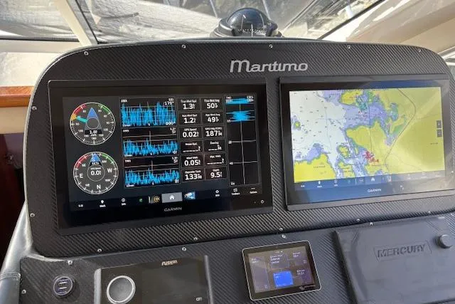 Dolce Far Niente Yacht Photos Pics Dashboard of 2012 Maritimo C53 Sports Cabriolet with navigation and performance displays.