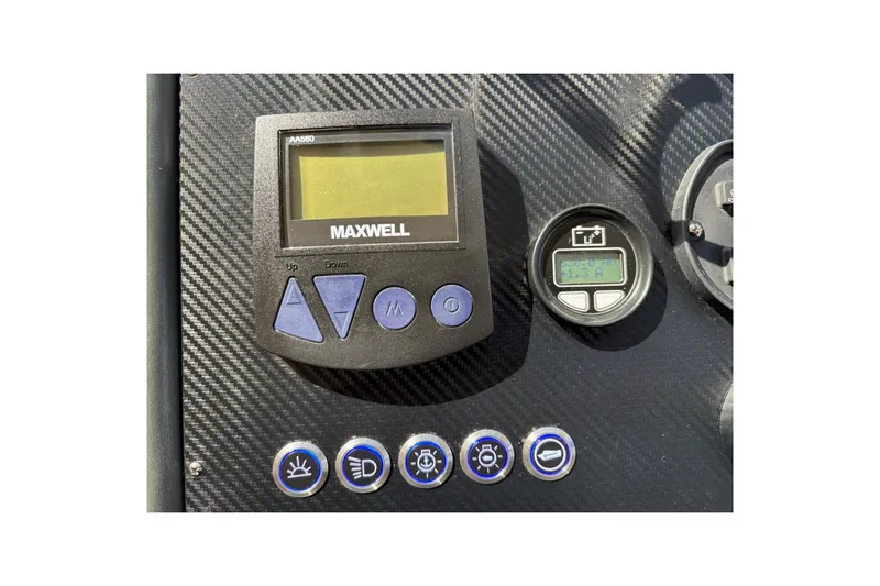 Dolce Far Niente Yacht Photos Pics Control panel of 2012 Maritimo C53 Sports Cabriolet with Maxwell display and buttons.