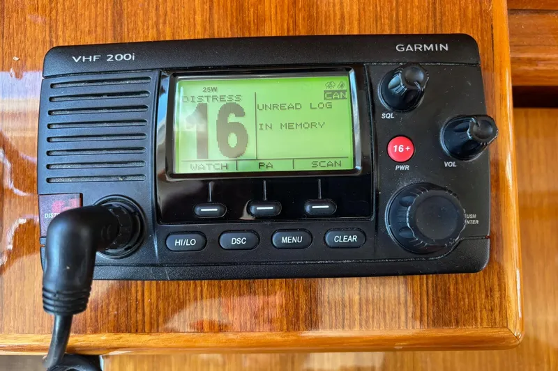 Dolce Far Niente Yacht Photos Pics Garmin VHF 200i radio on 2012 Maritimo C53 Sports Cabriolet, displaying distress channel 16.