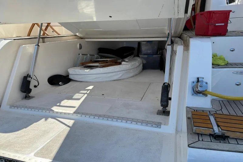 Dolce Far Niente Yacht Photos Pics 2012 Maritimo C53 Sports Cabriolet yacht storage compartment with various items inside.