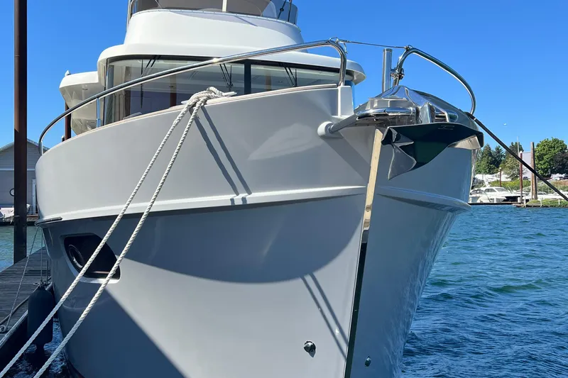 Billy Yacht Photos Pics 2014 Beneteau Swift Trawler 50 docked, showcasing sleek design and nautical elegance.