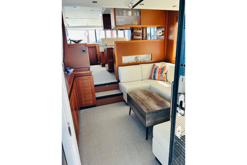 Billy Yacht Photos Pics Luxurious interior of 2014 Beneteau Swift Trawler 50 with modern furnishings and elegant design.
