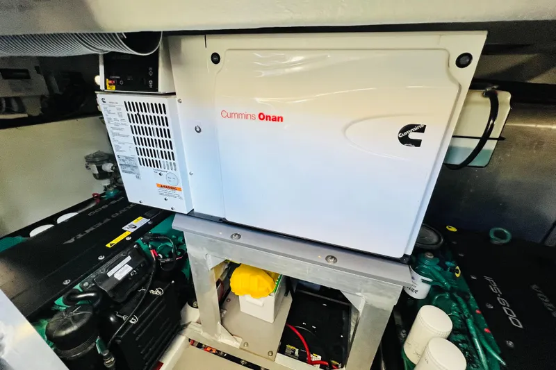 Billy Yacht Photos Pics Engine room of 2014 Beneteau Swift Trawler 50 with Cummins Onan generator.