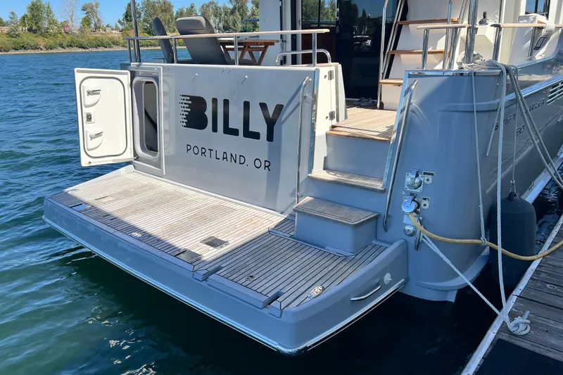 Billy Yacht Photos Pics 2014 Beneteau Swift Trawler 50 docked, featuring "BILLY" from Portland, OR on the stern.