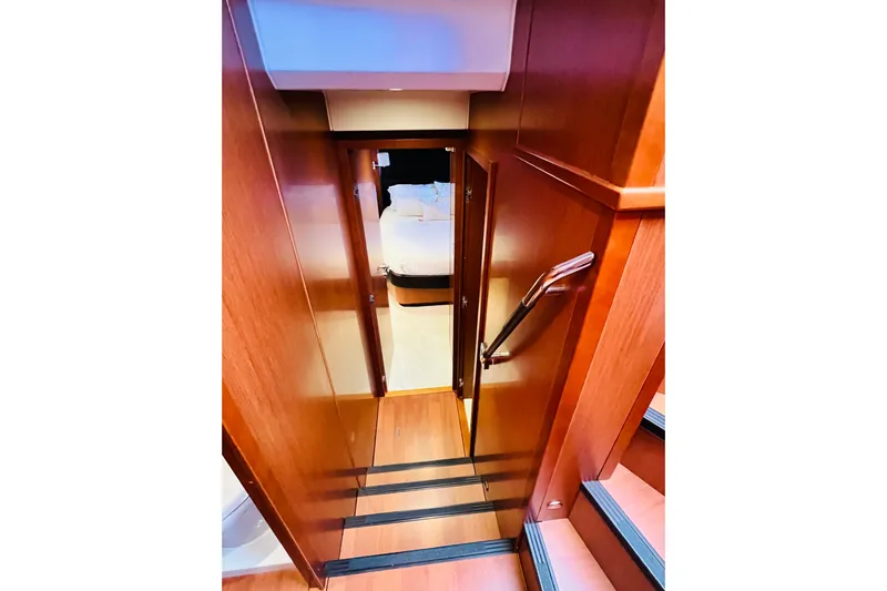 Billy Yacht Photos Pics Stairway leading to cabin in 2014 Beneteau Swift Trawler 50 yacht interior.