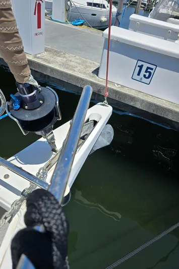  Yacht Photos Pics 2017 Jeanneau Sun Odyssey 389 docked at marina, showing bow and mooring line.