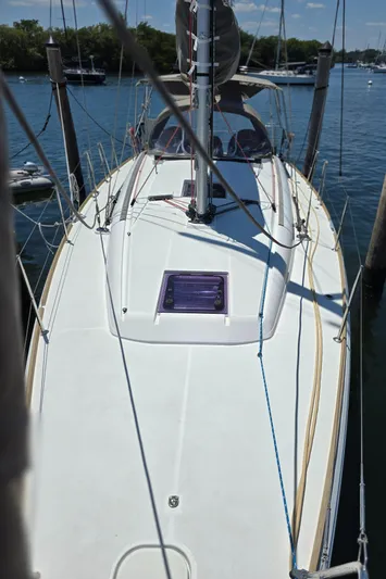  Yacht Photos Pics 2017 Jeanneau Sun Odyssey 389 sailboat docked, top view of deck and mast.