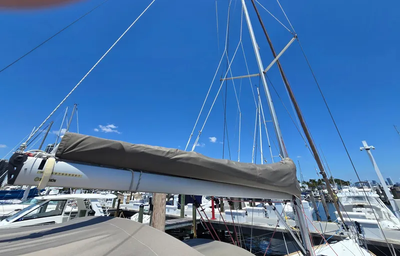 Yacht Photos Pics 2017 Jeanneau Sun Odyssey 389 sailboat docked at marina under clear blue sky.