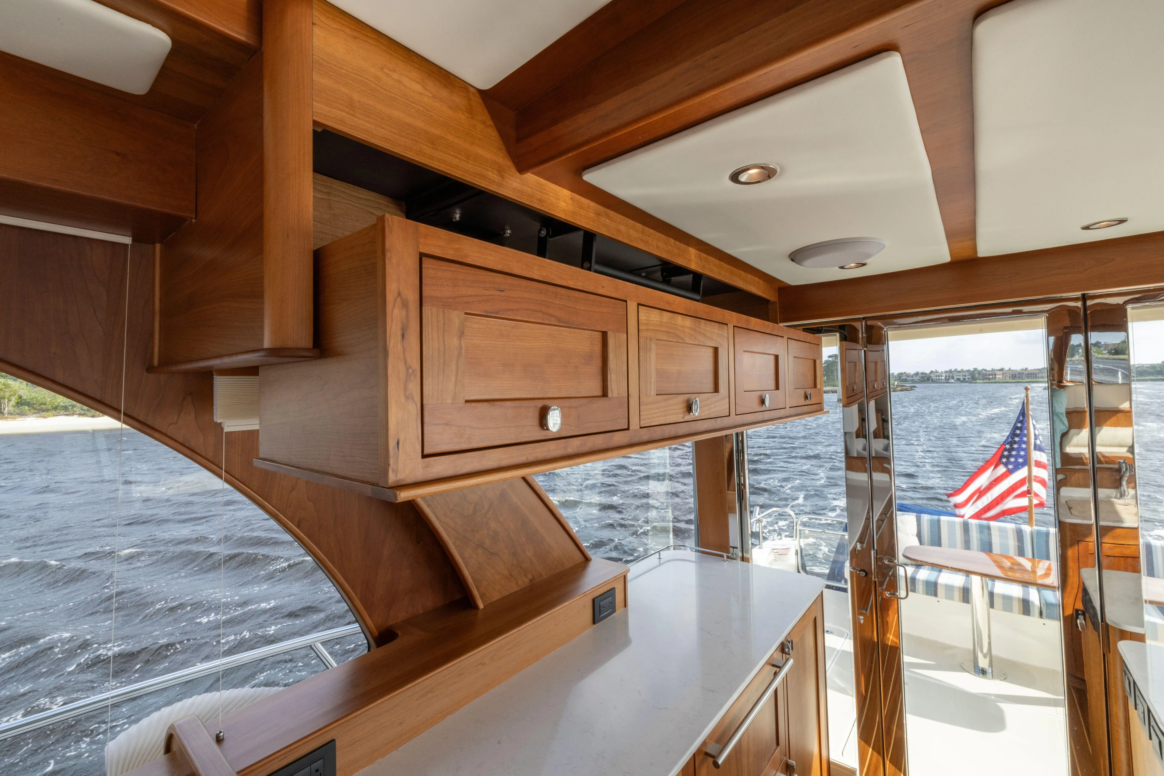 Beach To Beach Yacht Photos Pics Overhead galley lockers drop down for easy access at port