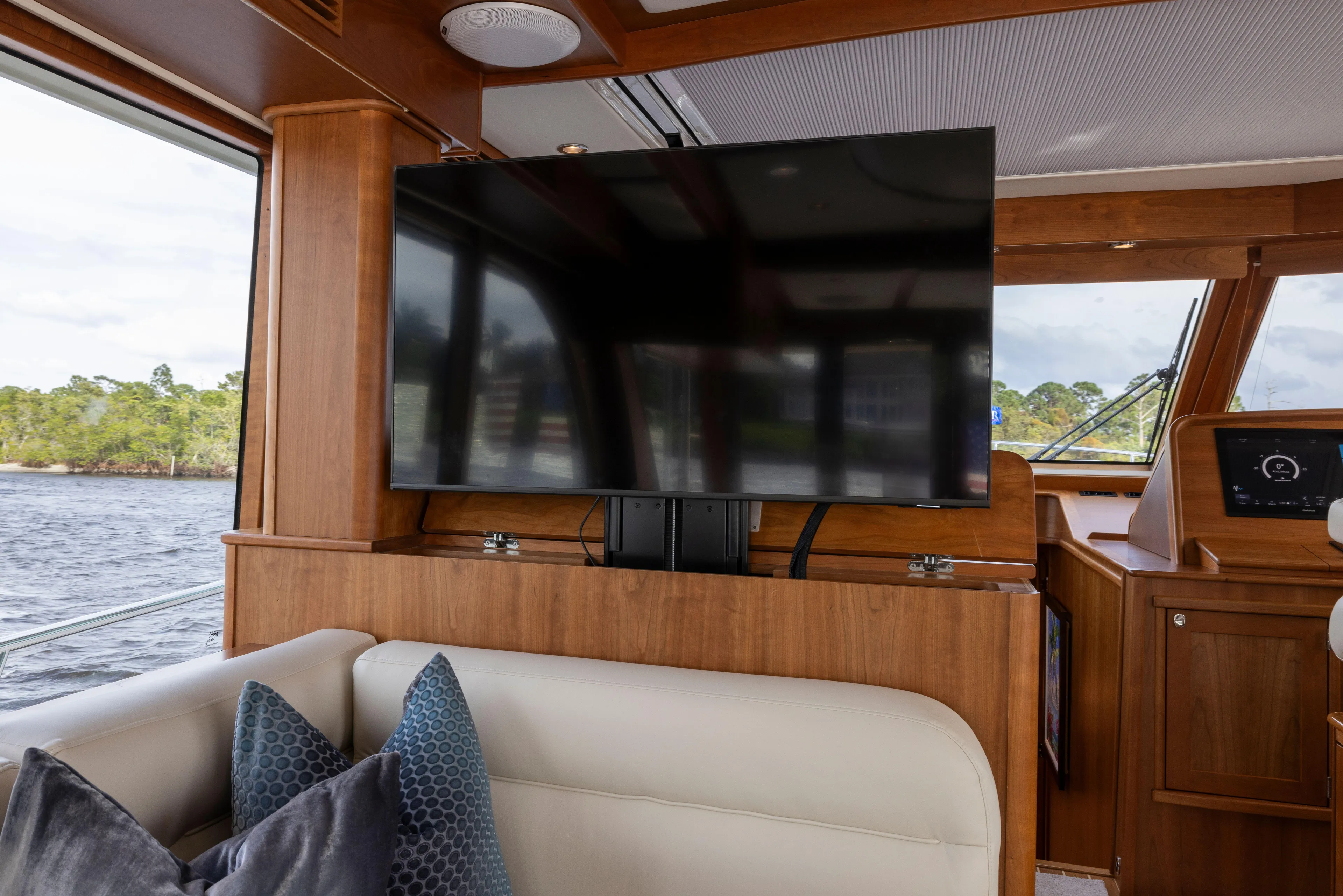 Beach To Beach Yacht Photos Pics Large TV easily viewed from pilothouse seating, galley and even the cockpit