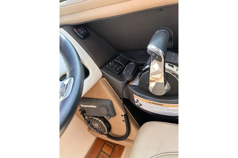  Yacht Photos Pics 2016 Sea Ray SLX 350 helm with Raymarine equipment and throttle controls.