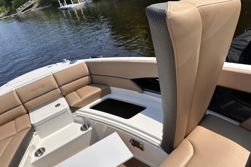  Yacht Photos Pics 2016 Sea Ray SLX 350 boat interior with tan seating and open storage compartment.