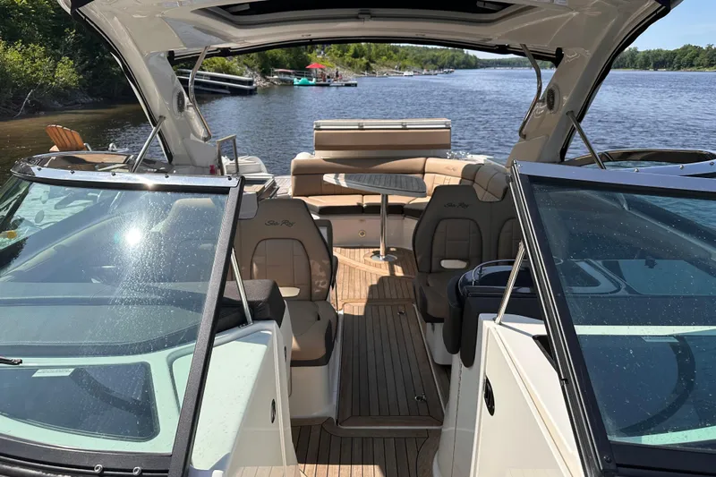  Yacht Photos Pics 2016 Sea Ray SLX 350 boat interior with seating, on a scenic river.