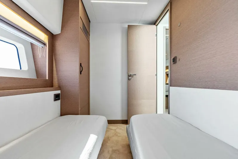 Anna Louise Yacht Photos Pics Interior of 2022 Prestige 590 Flybridge yacht with twin beds and modern design.