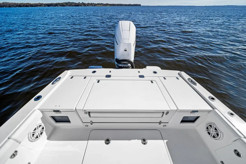 Your Next Boat! Yacht Photos Pics Manufacturer Provided Image: 2026 Blackfin 262 HB boat on water, showcasing spacious deck and powerful outboard motor.