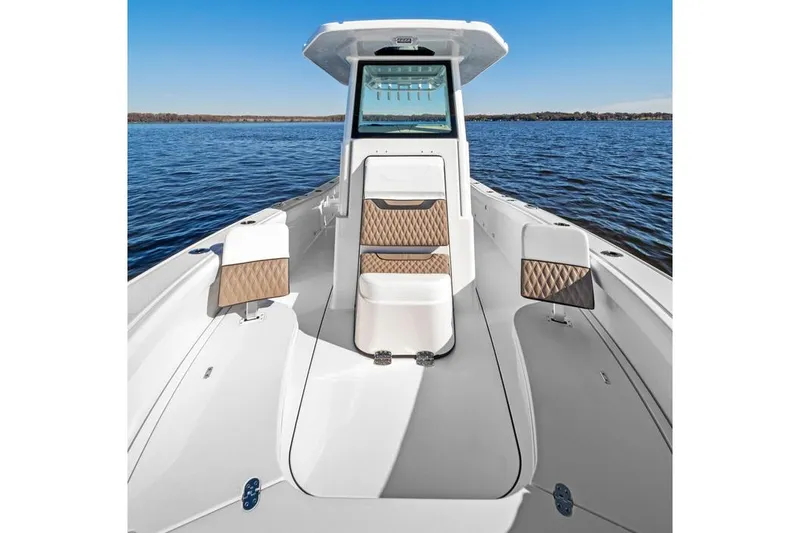 Your Next Boat! Yacht Photos Pics Manufacturer Provided Image: 2026 Blackfin 262 HB boat on calm water, featuring sleek design and comfortable seating.