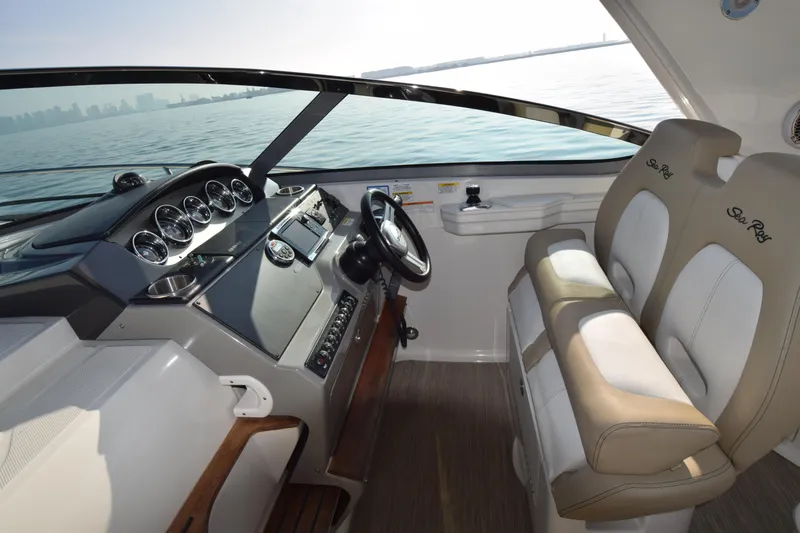 Just Plane Fun Yacht Photos Pics Interior of 2014 Sea Ray 350 Sundancer boat with helm and seating.