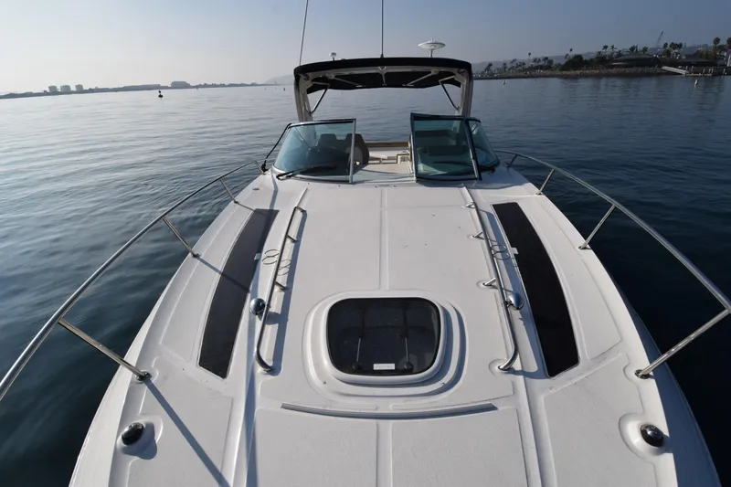 Just Plane Fun Yacht Photos Pics 2014 Sea Ray 350 Sundancer boat on calm water, front deck view.