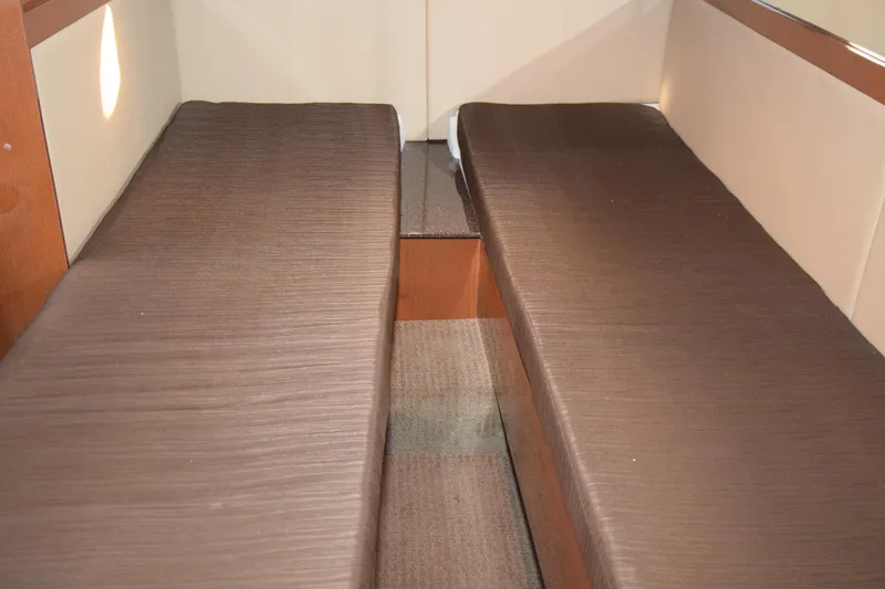 Just Plane Fun Yacht Photos Pics Interior cabin of 2014 Sea Ray 350 Sundancer with twin beds.